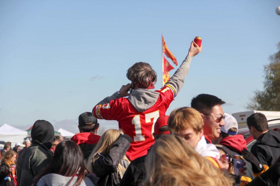 A student celebrates Iowa States first touchdown against the TCU Horned Frogs game at Iowa States Homecoming tailgate Oct. 28, 2017.