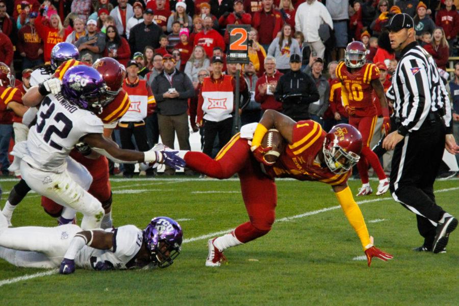 Running back Joshua Thomas falls to the ground during the game against TCU on Oct. 17, 2015. The Cyclones lost 45-21.