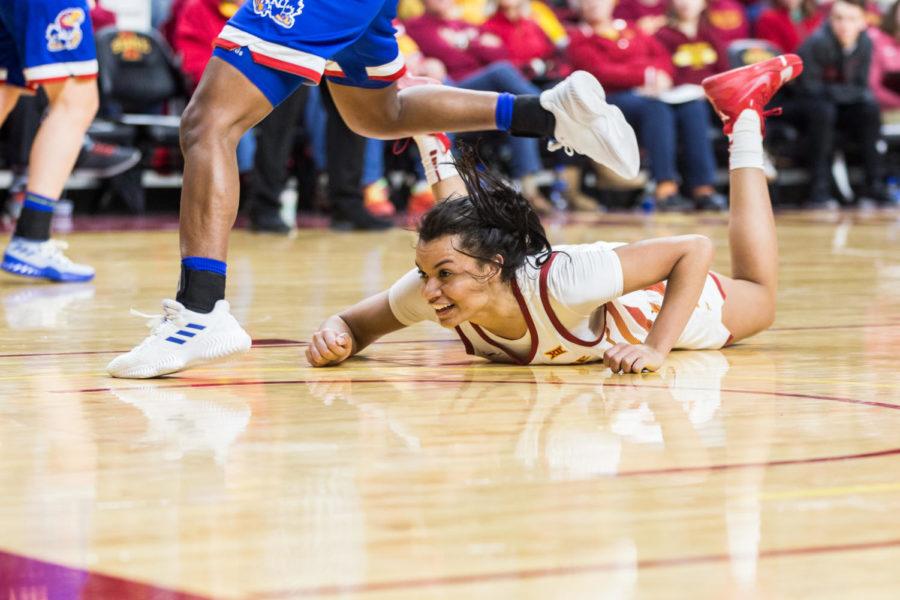 Iowa State then-sohpomore center Kristin Scott falls to the ground during the Iowa State vs. Kansas Senior Night basketball game May 4 in Hilton Coliseum. The Cyclones defeated the Jayhawks 69-49.
