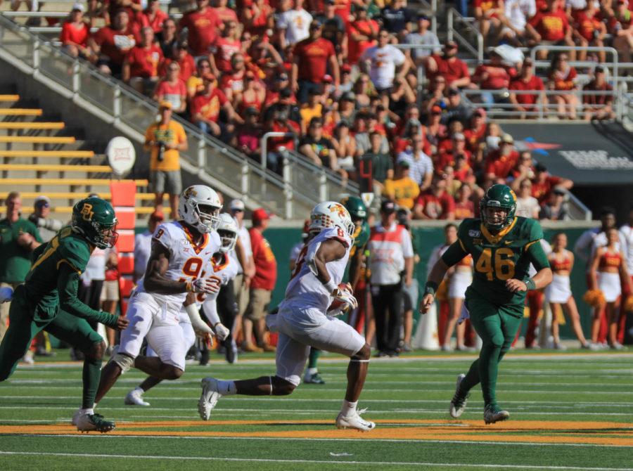 Wide receiver Deshaunte Jones runs at the Baylor defense after making a catch in the Cyclones 23-21 loss to the Bears on Sept. 29.