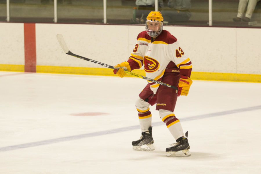 Then-sophomore Gabe Bortscheller skates backward down the ice during the Cardinal and Gold Team Scrimmage on Sept. 15, 2017. Bortscheller, now a senior, had to give up hockey due to a medical heart condition.