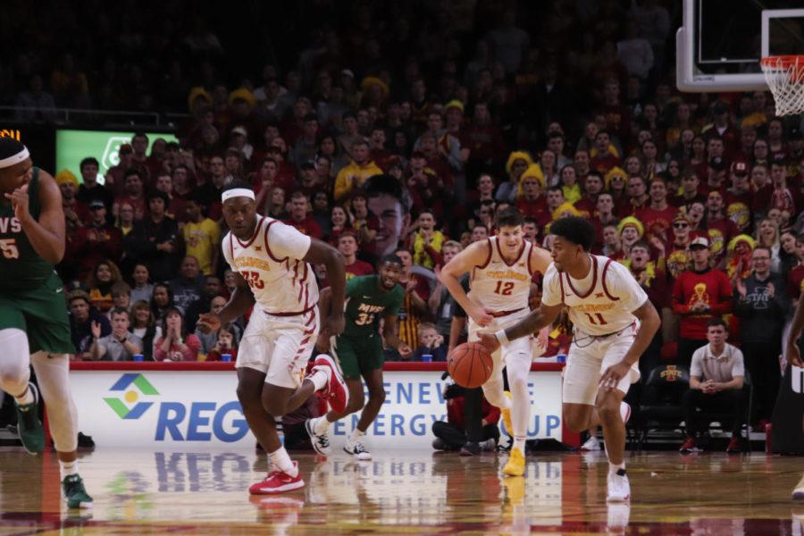 Senior guard Prentiss Nixon pushes up the court with junior forward Solomon Young during Iowa State’s 110-74 victory over the Mississippi Valley State Delta Devils on Tuesday at Hilton Coliseum.