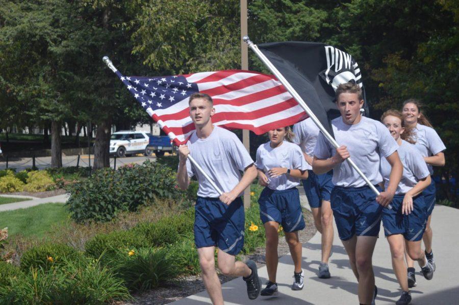 Members of the Iowa State Air Force ROTC finish their run for POW/MIA Day. Members ran from Des Moines to Ames starting at 9 a.m. Friday in September 2018. 