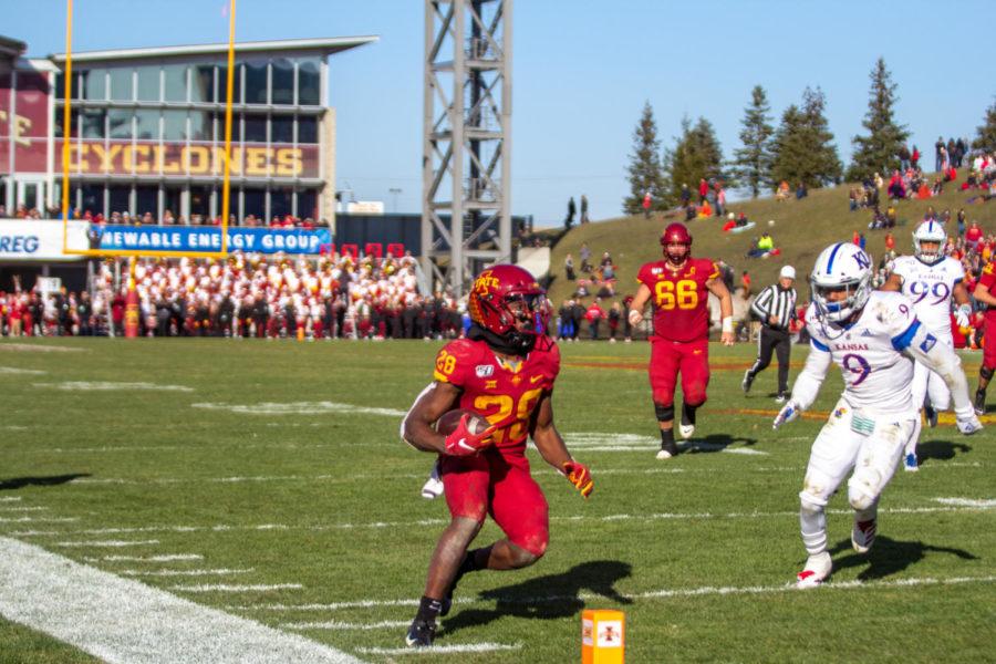 Running back Breece Hall makes the reception from quarterback Brock Purdy to convert another Iowa State touchdown against the University of Kansas, Iowa State won 41-31 on Nov. 23.