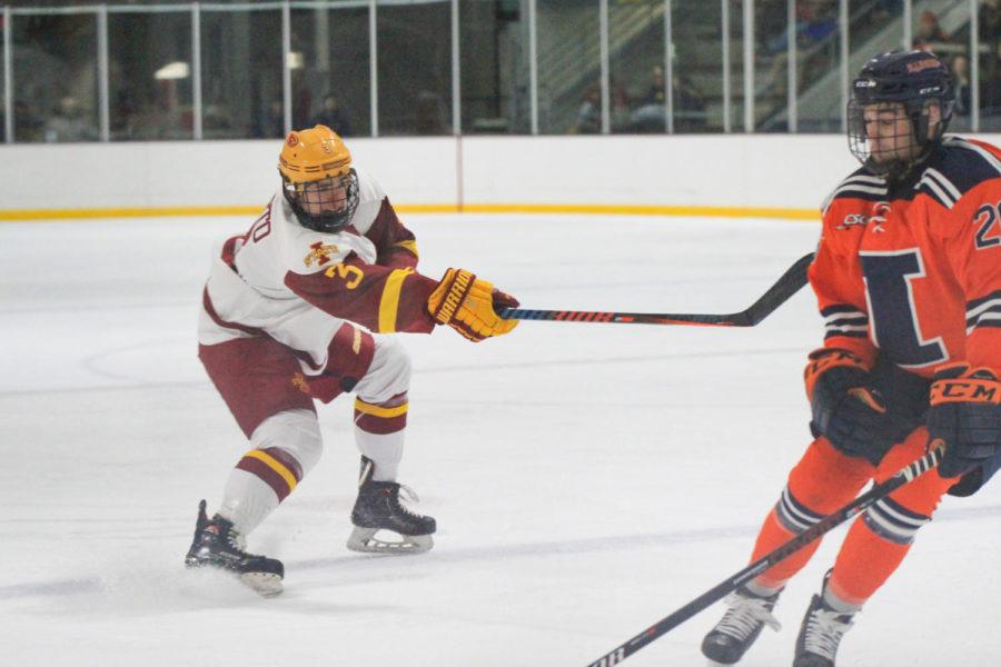 Brian+Bandyk+of+Cyclone+Hockey+races+University+of+Illinois+player+Tyler+Opilka+to+the+puck.+Iowa+State+hockey+faced+University+of+Illinois+on+Nov.%C2%A08.