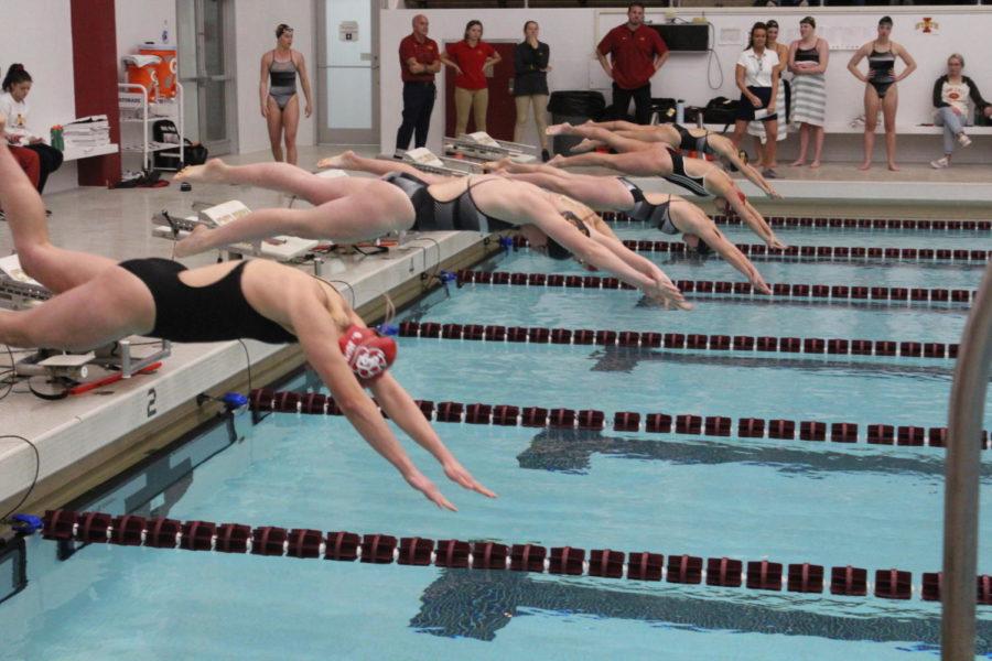 Iowa+State+and+South+Dakota+swimmers+start+the+50+freestyle+event+Nov.+8.+The+Cyclones+won+the+meet+212-84.