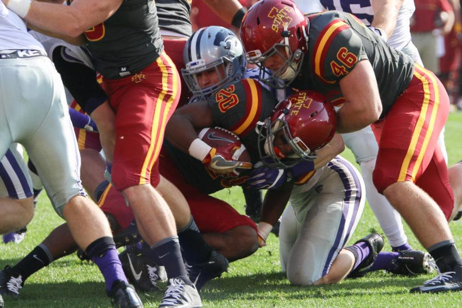 ISU defensive lineman Joshua Bailey is tackled during the game against Kansas State Oct. 29. The Cyclones would go on to fall to the Wildcats 31-26, making it their first homecoming loss since 2013. 