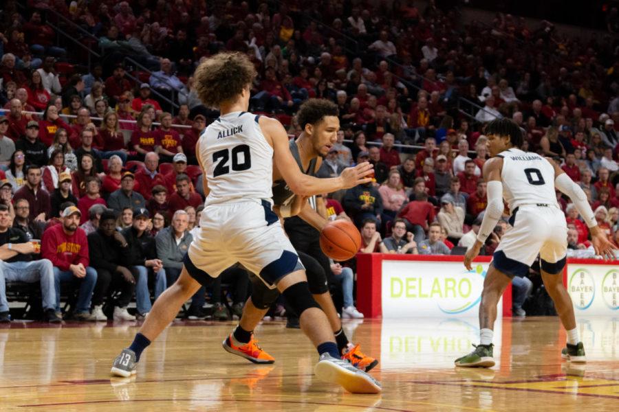 George Conditt IV battles under the hoop during the Iowa State basketball game against UMKC on Dec. 4.