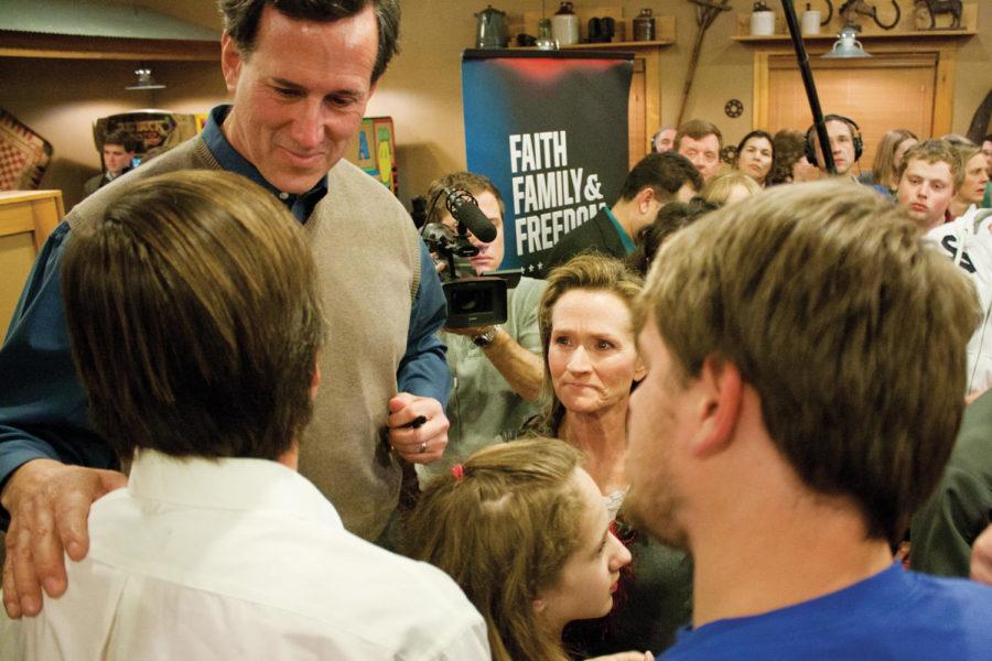 Rick Santorum meets people after giving a speech on Jan. 2, 2012, at the Pizza Ranch in Newton, Iowa.