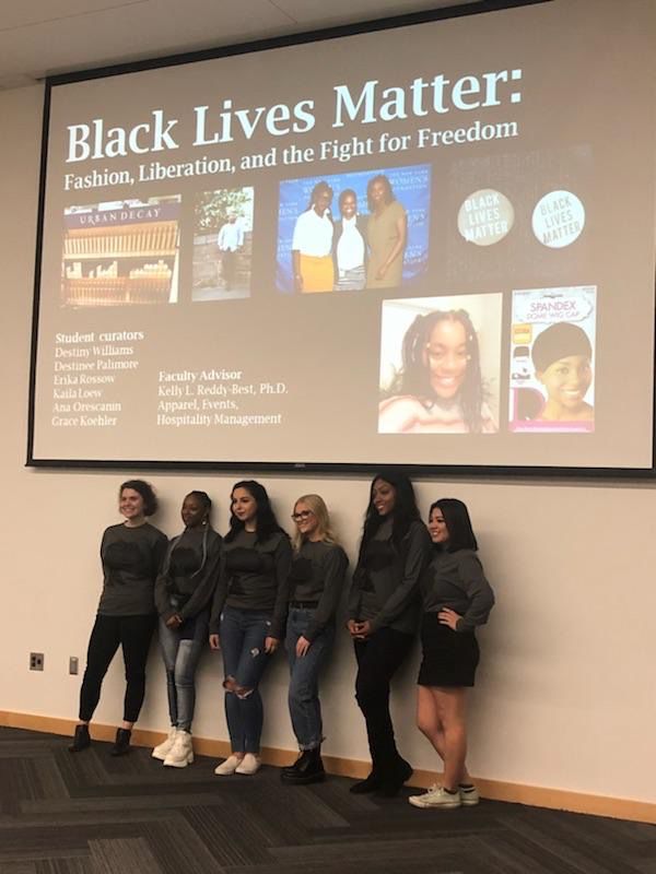 Students+from+the%C2%A0AESHM+499X%3A+Black+Lives+Matter+Liberation+and+Fashion+class+present+their+findings+at+the+Ames+Public+Library.