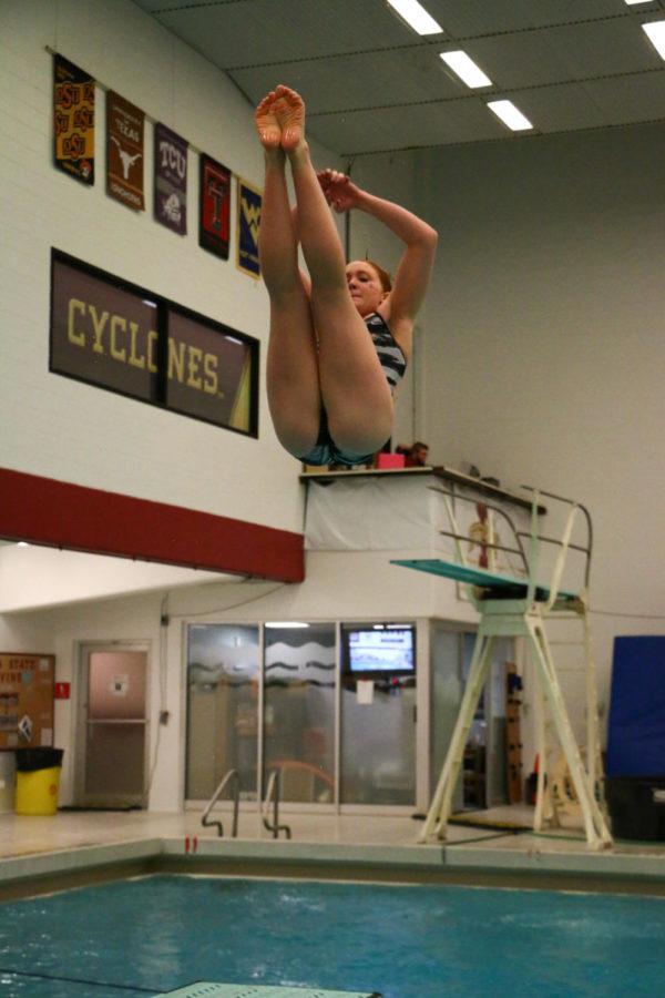 Iowa State then-junior Becky Stochl performs a dive. The Iowa State swim team hosted the annual Cy-Hawk swim meet Dec. 11, 2015, at Beyer Hall. The Hawkeyes would go on to win every event, contributing to the teams 190-93 win. 