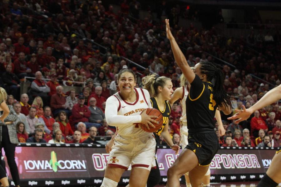 Iowa State then-junior guard Rae Johnson drives to the hoop in Iowa States game against Iowa on Dec. 11.