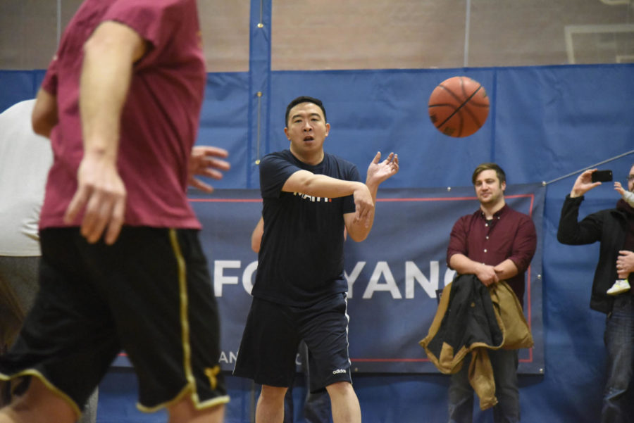 Presidential candidate and businessman Andrew Yang played basketball alongside Democratic congressional candidate J.D. Scholten on Dec. 12 in the Ames Community Center.