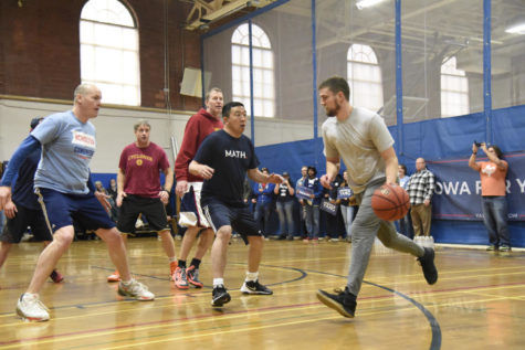 Presidential candidate and businessman Andrew Yang played basketball alongside Democratic congressional candidate J.D. Scholten on Dec. 12 in the Ames Community Center.