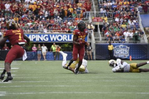 Iowa State running back Breece Hall tries to find space against Notre Dame during the Camping World Bowl on Dec. 28, 2019.