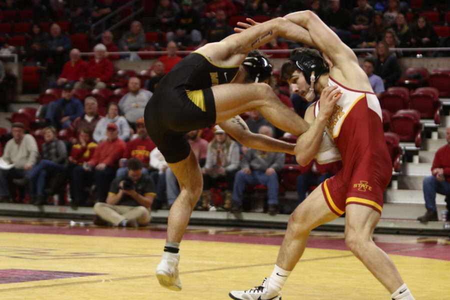 Iowa State then-redshirt sophomore Jarrett Degen makes a move on his opponent during the dual against Missouri on Feb. 24.
