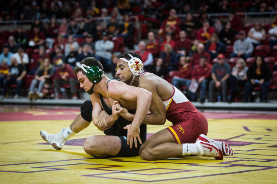 Then-redshirt freshman Marcus Coleman wrestles redshirt freshman Kyle Snelling during the Iowa State vs Utah Valley dual meet Feb. 3 in Hilton Coliseum. Coleman won by technical fall 17-2 and the Cyclones defeated the Wolverines 53-0.