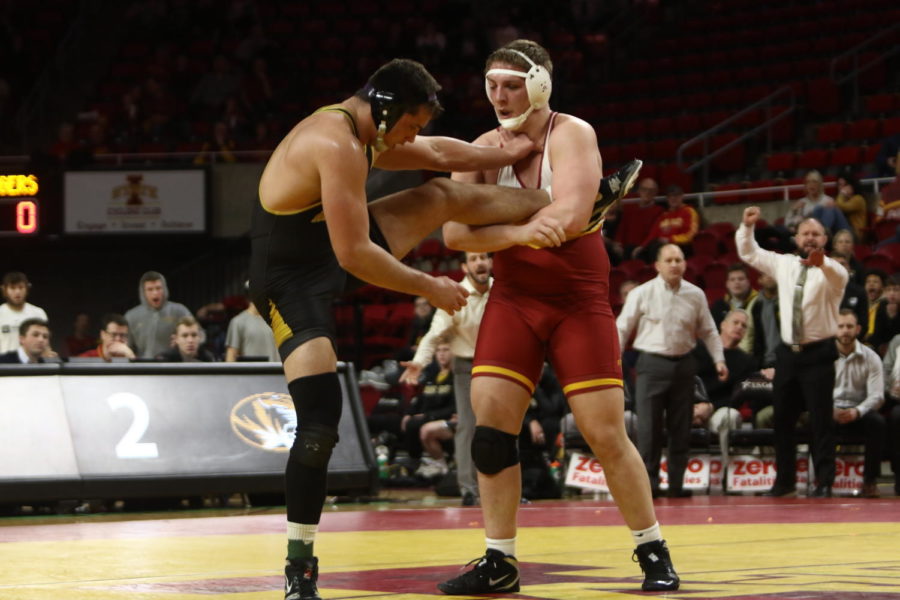 Iowa State then-redshirt sophomore Gannon Gremmel sets up a takedown attempt during his match during the dual against Missouri.