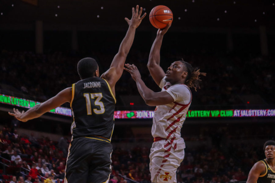 Junior forward Solomon Young shoots the ball during Iowa State’s 73-45 victory over Southern Mississippi on Nov. 19 at Hilton Coliseum.