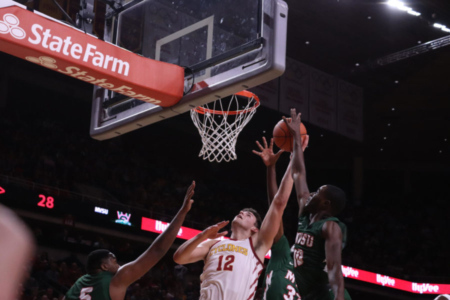 Senior forward Michael Jacobson shoots a contested layup during Iowa State’s 110-74 victory over the Mississippi Valley State Delta Devils at Hilton Coliseum on Nov. 5.