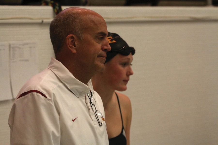 Coach Duane Sorenson looks on during the 400 free
finals Saturday, Feb. 4, at Beyer Hall. The ISU swimming and diving
team hosted Kansas for its last home meet of the season. The team
honored the five seniors on the squad before the beginning of the
meet.
