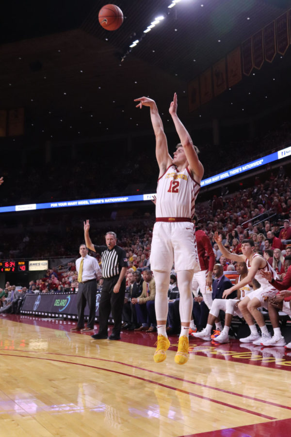 Senior forward Michael Jacobson shoots a three-point shot during Iowa State’s 110-74 victory over the Mississippi Valley State Delta Devils on Nov. 5 at Hilton Coliseum.