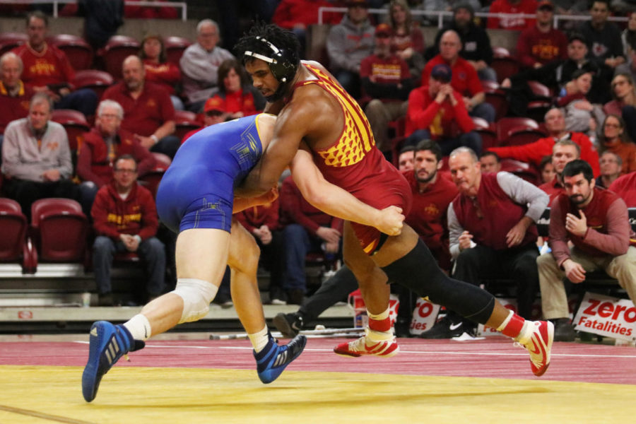 Iowa States then-redshirt sophomore Sam Colbray takes on South Dakota State sophomore Zach Carlson as a part of the 184-pound weight class during the second period of their match Feb. 1 at Hilton Coliseum. Colbray won the matchup. The Iowa State wrestling team won 47-0 against South Dakota State.