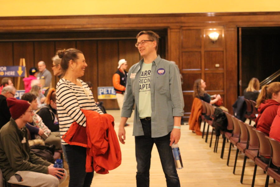 Students and community members gathered to caucus Feb. 3 in the Sun Room of the Memorial Union.