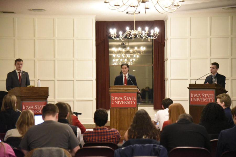 Student Government vice-presidential candidates on stage at the debate Feb. 11. All three candidates discussed their platforms and campus topics.
