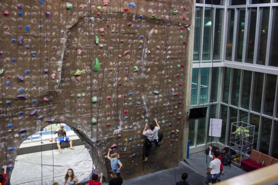 Students+climbing+the+rock+wall+at+State+Gym.+Members+of+the+kinesiology+department+said+being+healthy+is+more+than+weight+loss+and+working+out.