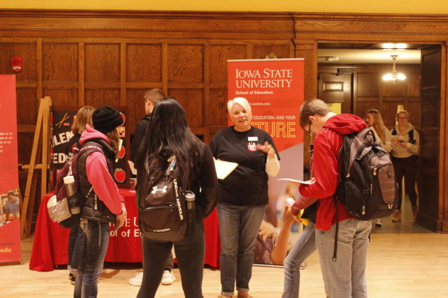 Elementary Education adviser Becky Koenen speaks with a group of students about the School of Education. The Iowa State School of Education educates future teachers from early education to K-12.