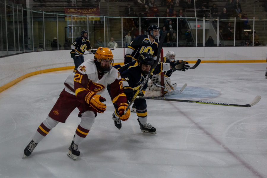 Sophomore Brooks Mitzel races towards the puck at Saturdays game. The Cyclones lost against the Bronchos.