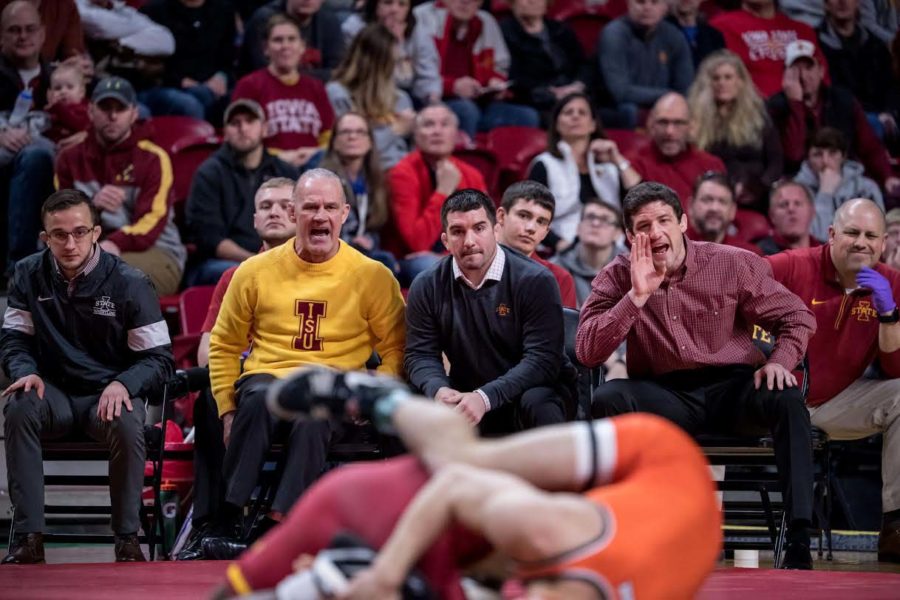 Kevin Dresser and his coaching staff look on during the duel against Oklahoma State on Jan. 26 at Hilton Coliseum.