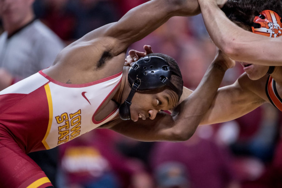 Todd Small locks up with Oklahoma States Reece Witcraft during the Cyclones and the Cowboys dual on Jan. 26.