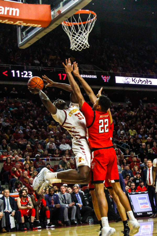 Junior forward Solomon Young draws contact on a shot attempt against Texas Tech on Feb.22 in Hilton Coliseum.