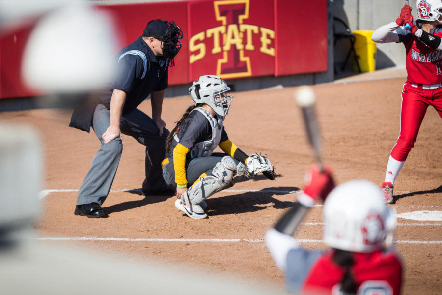 An Iowa State catcher waits for a pitch during the Iowa State vs. South Dakota softball game held at the Cyclone Sports Complex on April 2. The Cyclones had three home run hits and defeated the Coyotes 9-1. 