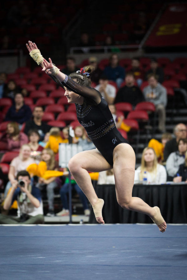 Iowa State freshman Madelyn Langkamp competes on floor during the fourth and final rotation of the Iowa State vs Oklahoma gymnastics meet. The No. 23 ranked Cyclones were defeated by the No. 1 ranked Sooners 196.275-197.575