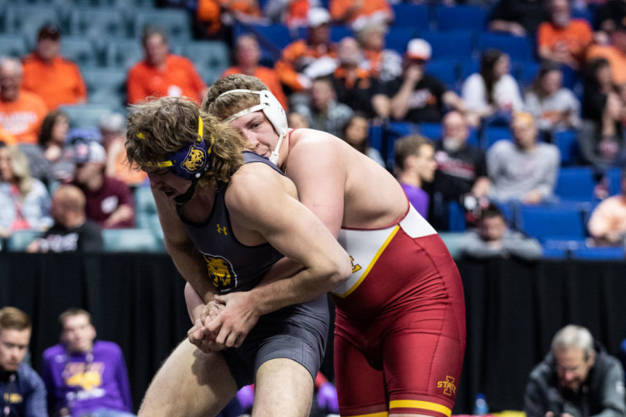 Iowa States Gannon Gremmel in the middle of riding Northern Colorados Dalton Robertson in their heavyweight semifinal matchup on March 7 at the Big 12 Championships inside the Bank of Oklahoma Center in Tulsa.