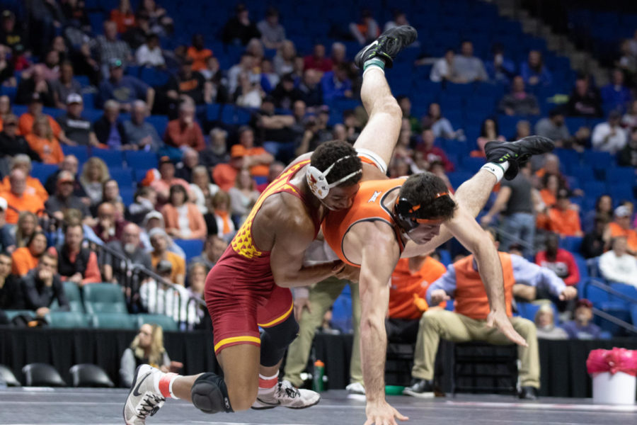 Iowa States David Carr takes down Oklahoma States Wyatt Sheets in their 157-pound championship match March 8 at the Big 12 Championships inside the Bank of Oklahoma Center in Tulsa, Oklahoma.