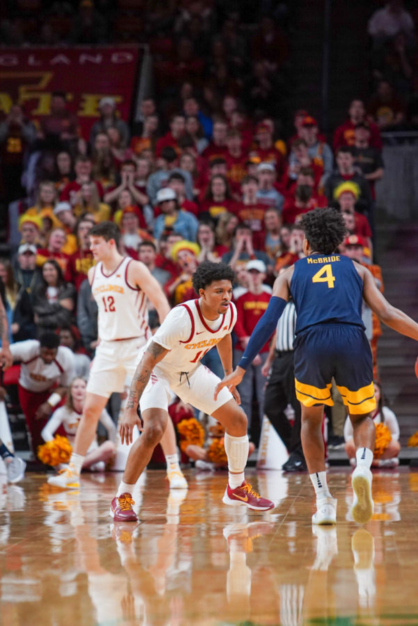 Senior guard Prentiss Nixon guards West Virginias Miles McBride on the perimeter for Iowa State on March 3 in its last home game of the season at Hilton Coliseum.