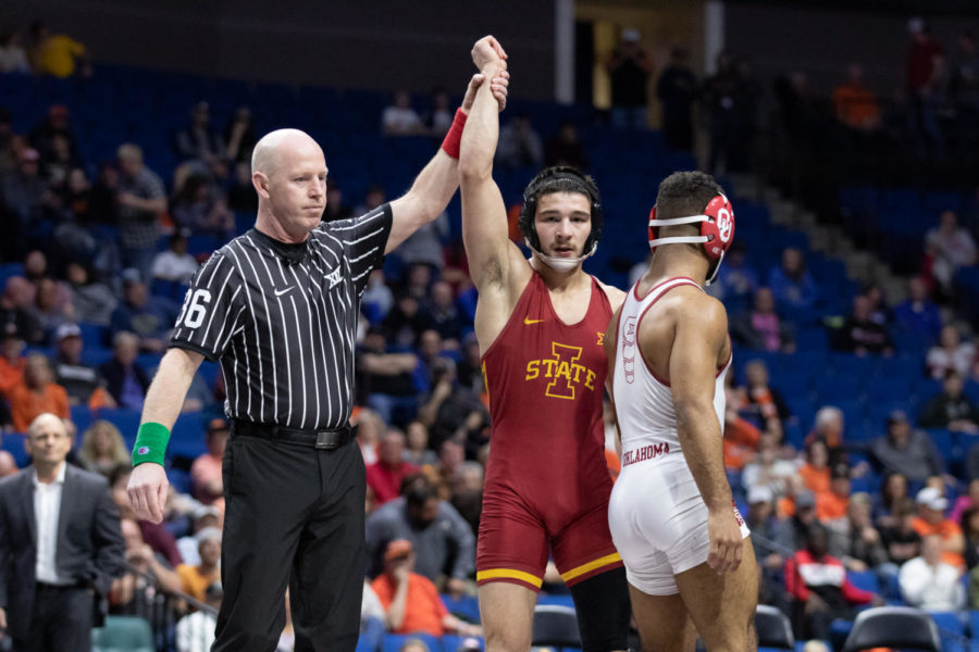 Iowa States Ian Parker has his arm raised in victory after he defeats Oklahomas Dom Demas 4-2 in sudden victory in their 141-pound championship match March 8 at the Big 12 Championships inside the Bank of Oklahoma Center in Tulsa.