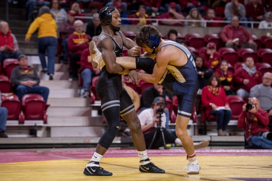 Todd Small prepares for a takedown against Franco Valdez during the Iowa State and Chattanooga dual on Dec. 14.