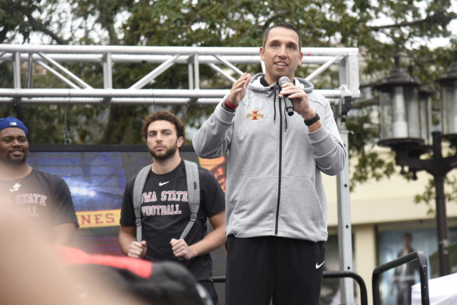 Iowa State Head Coach Matt Campbell speaks to fans packed in the Pointe Orlando Plaza during the Camping World Bowl fan pep rally Dec. 27, 2019. 