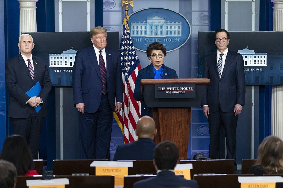 Small Business Administration (SBA) Administrator Jovita Carranza speaks at a White House coronavirus briefing as President Donald Trump and other administration officials look on. The SBA oversees the Paycheck Protection Program loans, which have run out of funding during the COVID-19 pandemic.