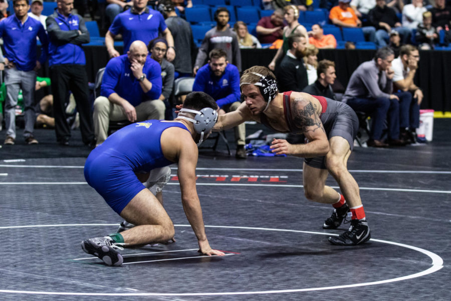 Iowa States Alex Mackall and South Dakota States Danny Vega wrestle in their quarterfinal matchup at 125 pounds on March 7 at the Big 12 Championships inside the Bank of Oklahoma Center in Tulsa, Oklahoma. 