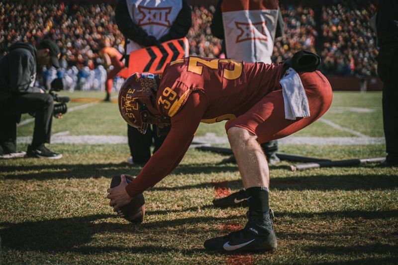 Former Iowa State long snapper Steve Wirtel warms up before Iowa State faces Kansas on Nov. 23. Iowa State won the game 41-31.