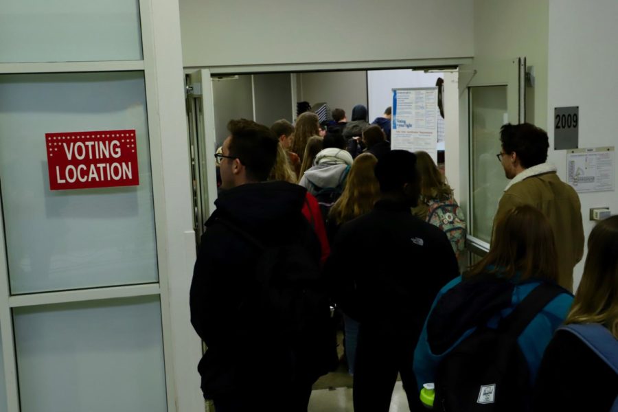Students wait in line to vote for the 2018 midterm election Nov. 6, 2018, inside Buchanan Hall.