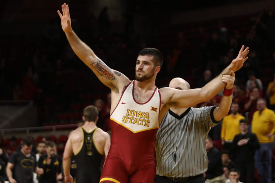 Iowa State then-redshirt senior Willie Miklus celebrates after securing a win in his final match Feb. 24 at Hilton Coliseum.