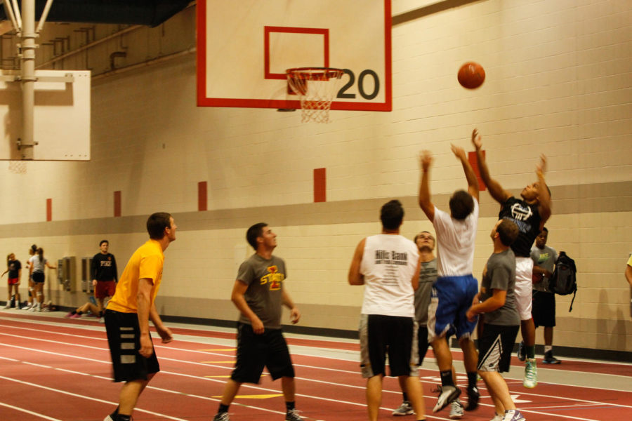 Intramural basketball teams play each other on Oct. 8, 2014, at Lied Recreation Athletic Center for a tournament.