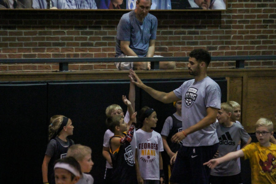 Former Iowa State mens basketball stand out Georges Niang high fives participants at his fourth annual summer basketball camp at the All Iowa Attack Basketball Facilities on July 28. Niang was a three time All-Big 12 player while at Iowa State.